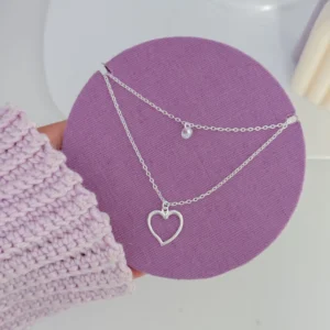 Colar duplo coração e ponto de luz